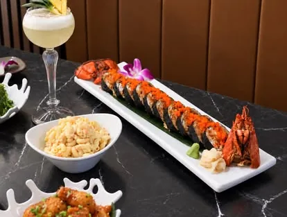 Crispy shrimp, macaroni salad and a sushi roll at Aloha