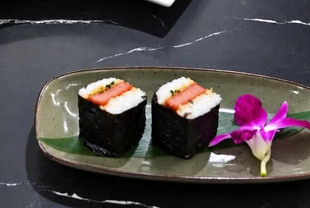 Two pieces of Spam musubi wrapped in nori